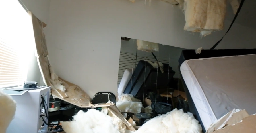 Collapsed ceiling from severe water damage after upstairs bathroom overflow in a Somerset Bellevue, WA home